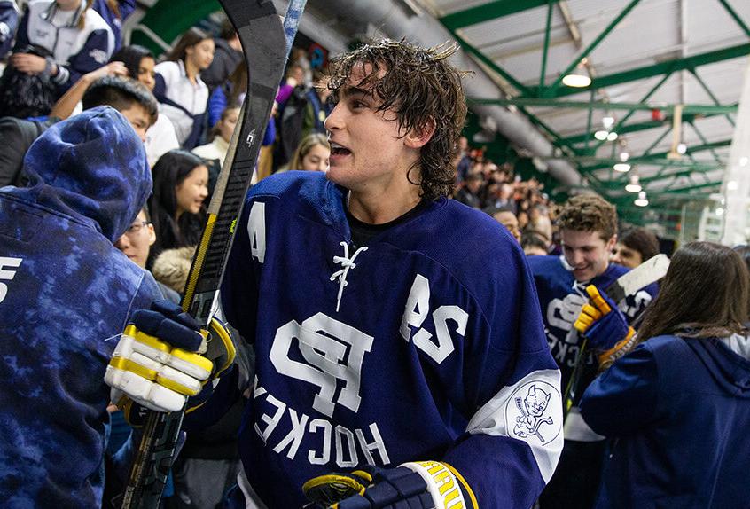 Poly Prep students playing hockey